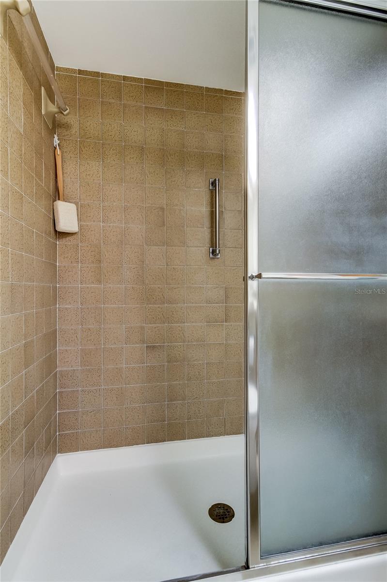 En Suite Bathroom (4.9' x 10.9') offers a convenient walk in shower!