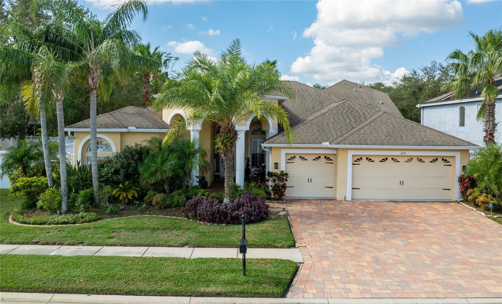 Beautiful Home with Pavered 3 Car Garage driveway.