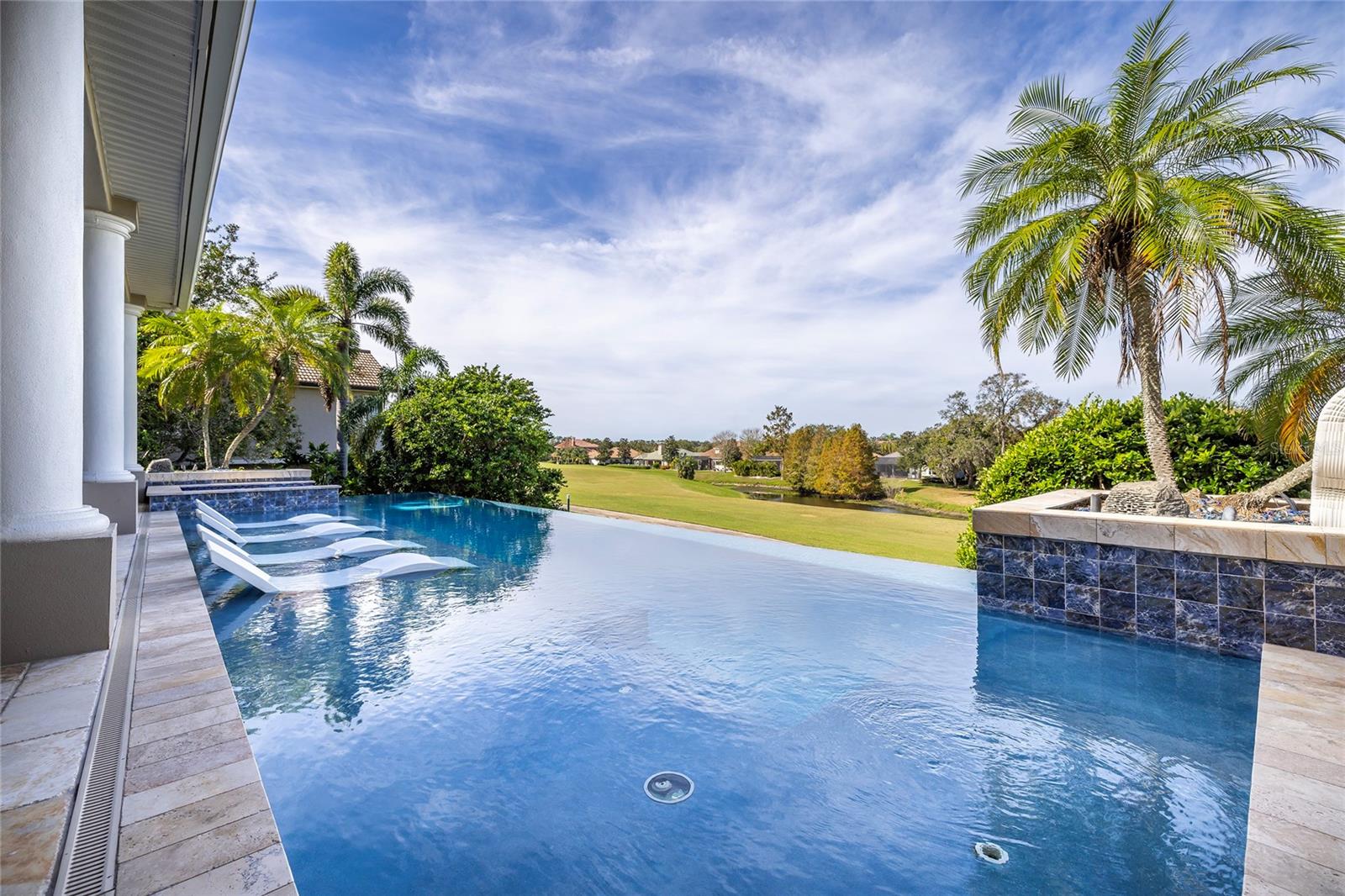 The infinity edge pool overlooks Innisbrook Resort Osprey Golf Course 8th fairway.