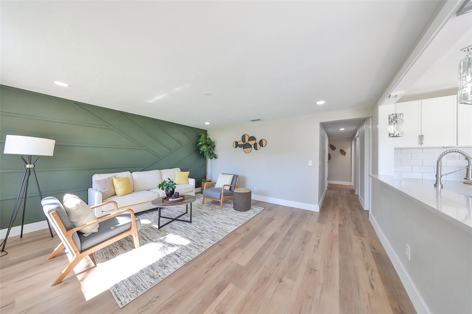 Bright and Airy Living Room Welcomes You!