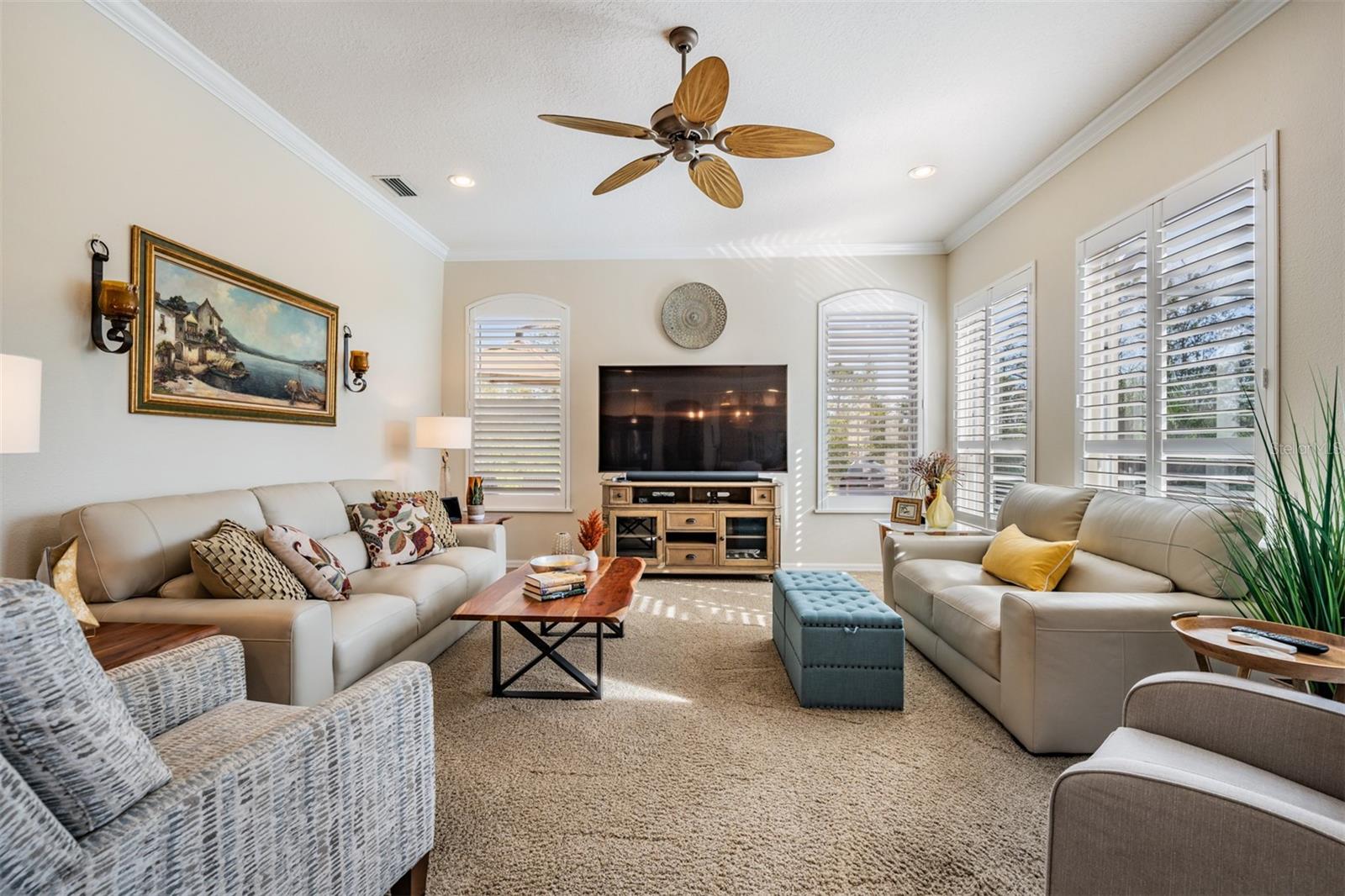 Large and Spacious Family Room, Inset lighting, ceiling fan and plantation shutters.