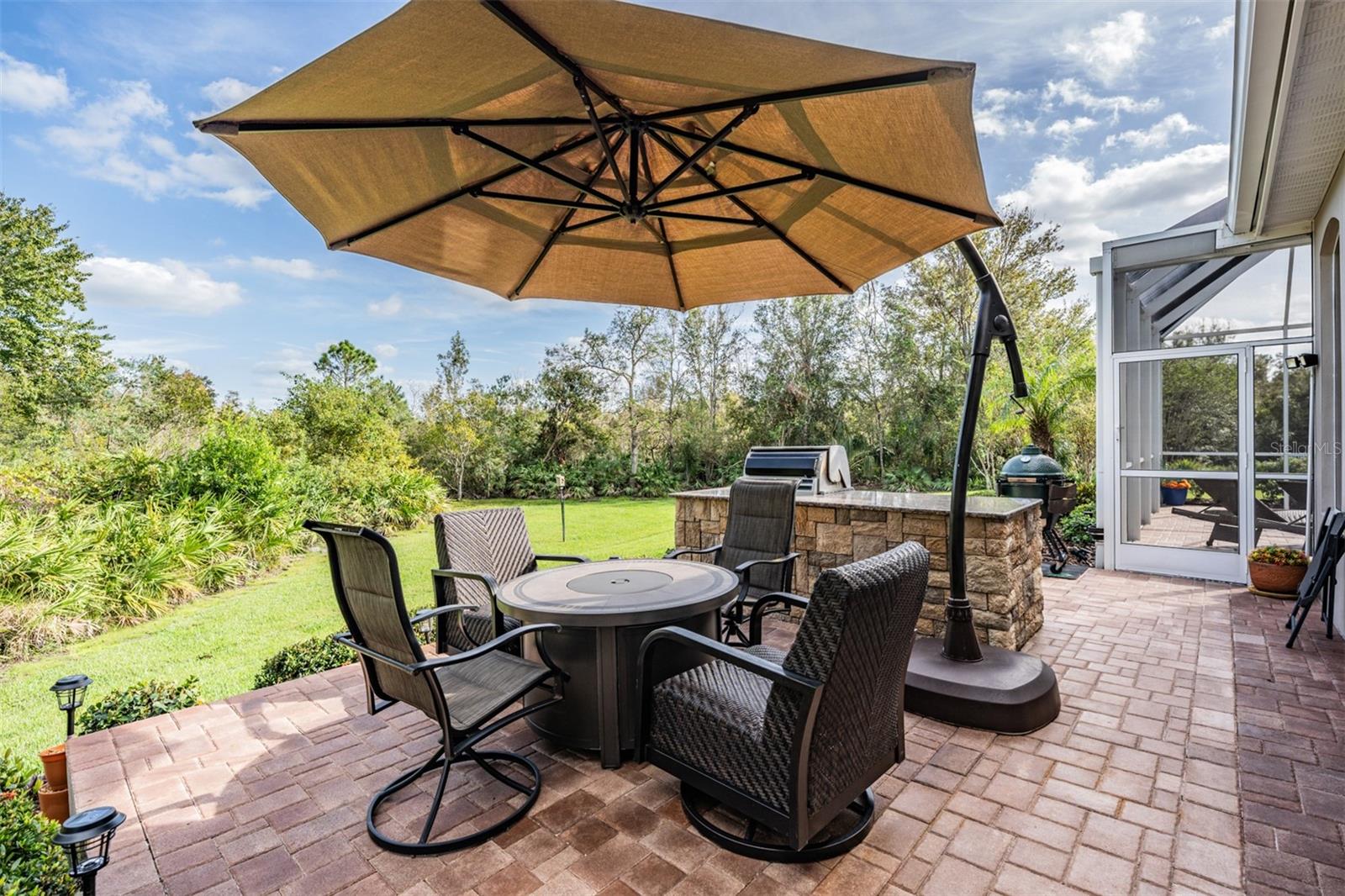 Back Patio with Pavers - Built in Grill!  And Overlooking the huge back yard.