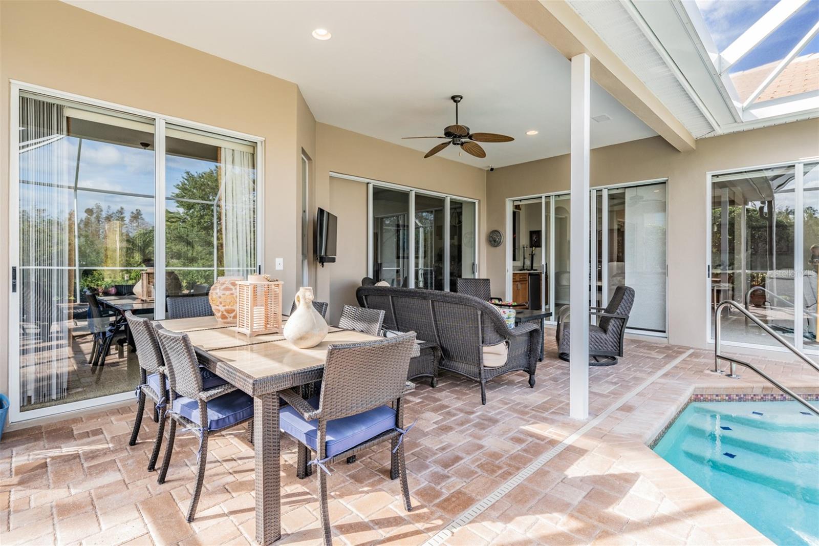 Lots of covered space for entertaining, Ceiling Fan and Inset Lights!