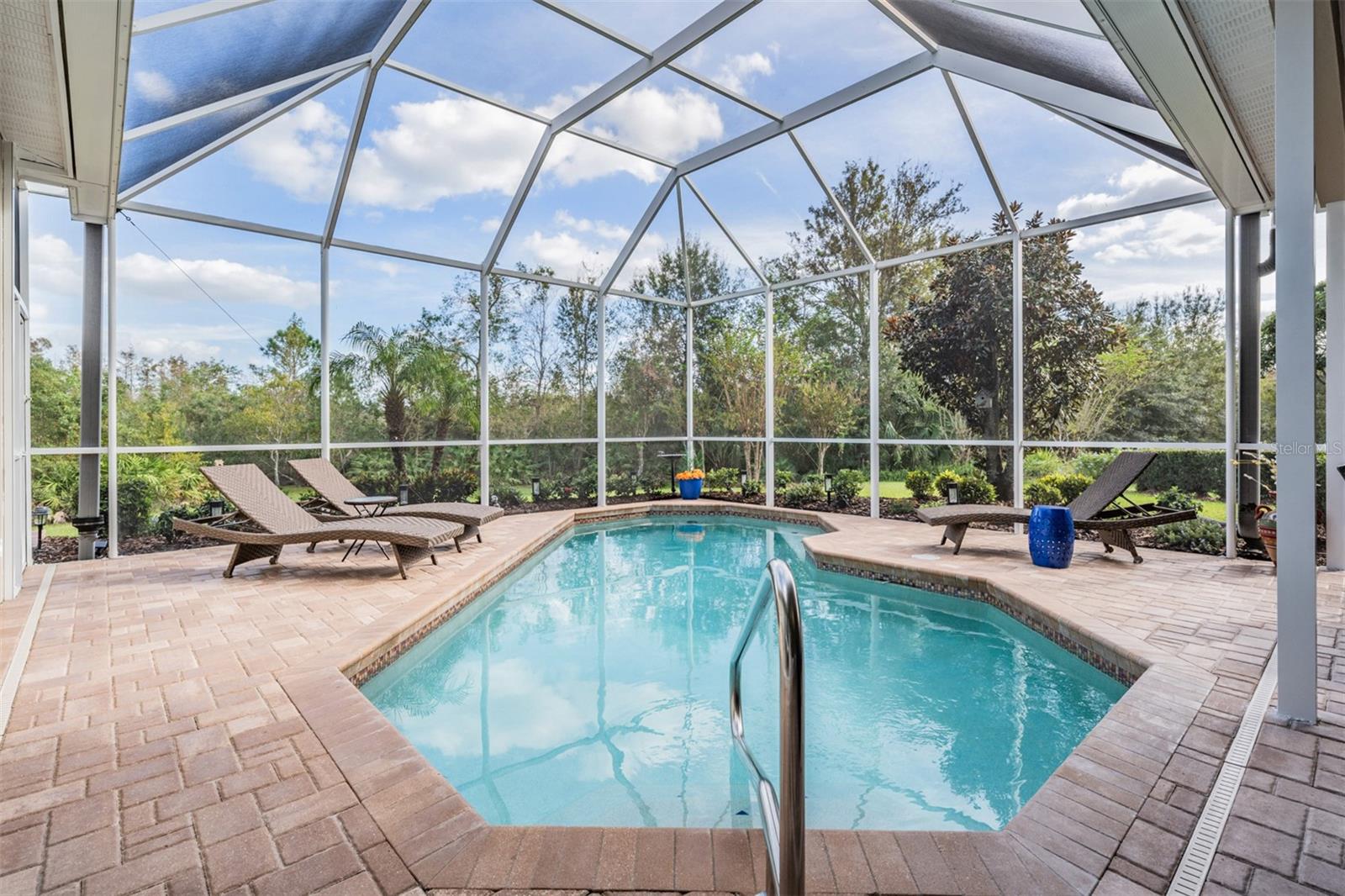 Pool, Pavered Lanai and a gorgeous conservation view.