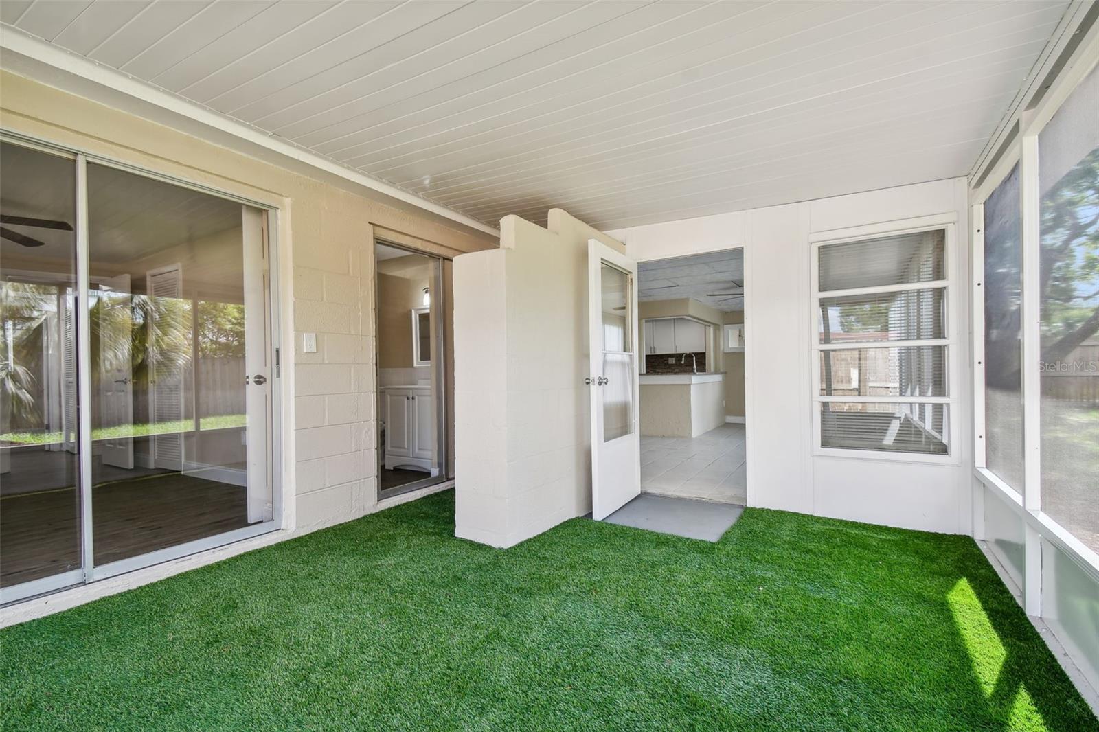 Screen enclosed porch off master bedroom & Florida room