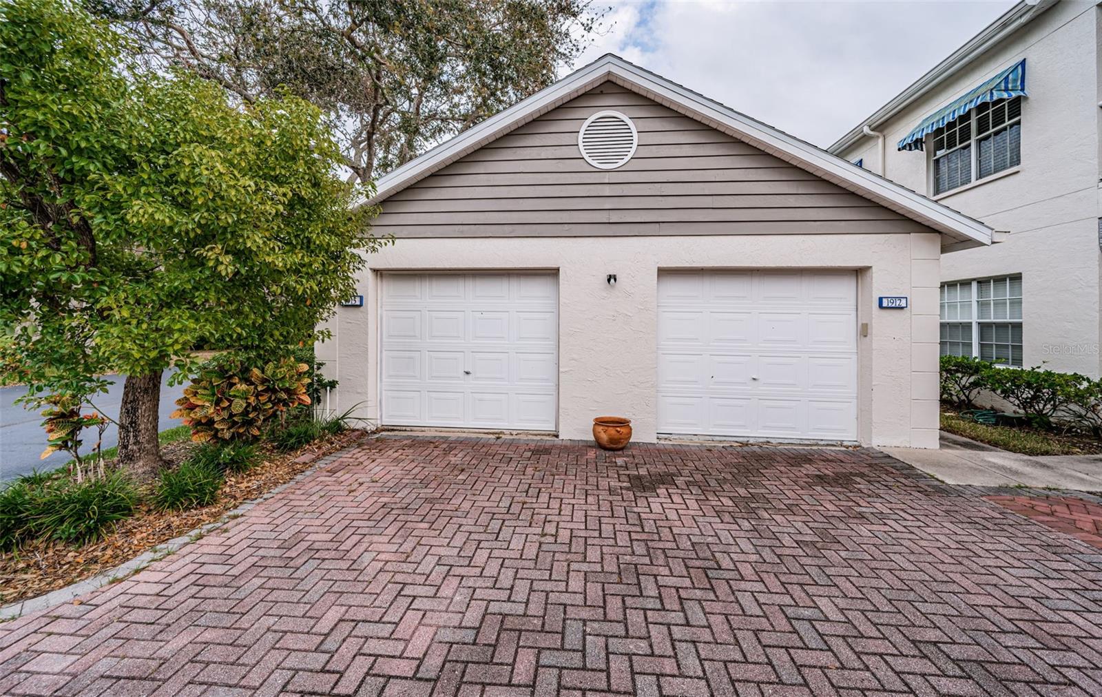 .. 21 x 13 Garage on Left Conveys with Condo # 1915.. You have Garage - Garage Parking Pad and Guest Parking. There is a remote control for Garage and another Door on the backside of the Garage.