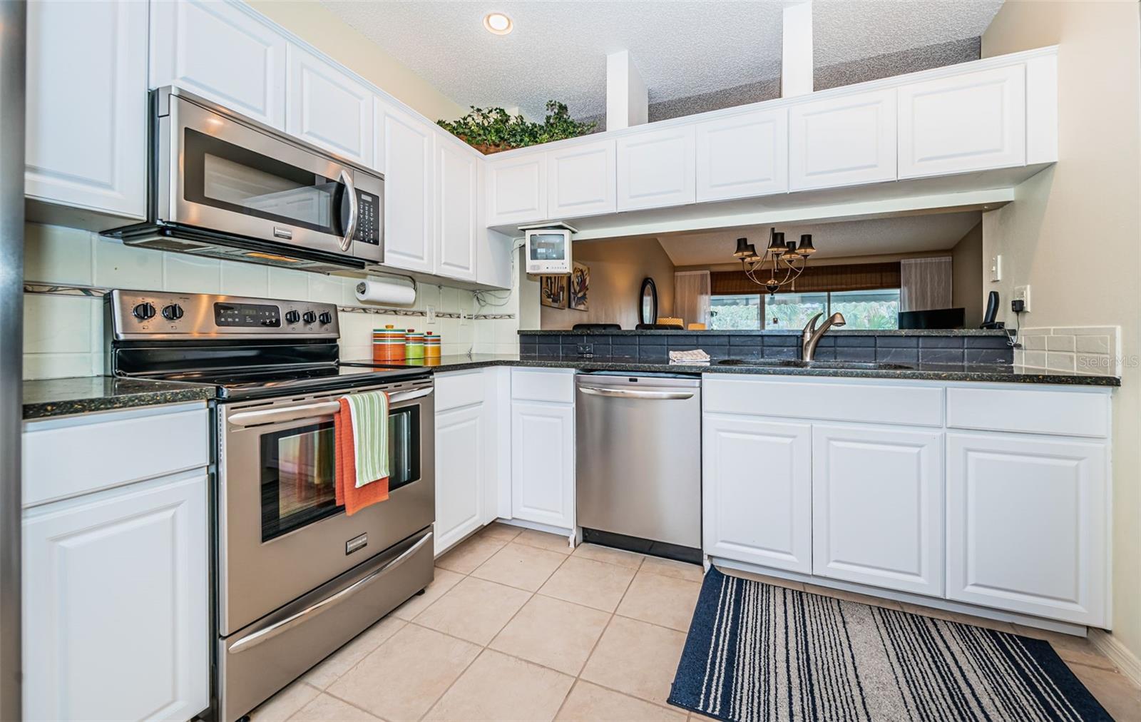 .. Kitchen Shot # 7.... Plenty of Cabinetry space.. Closet Pantry..