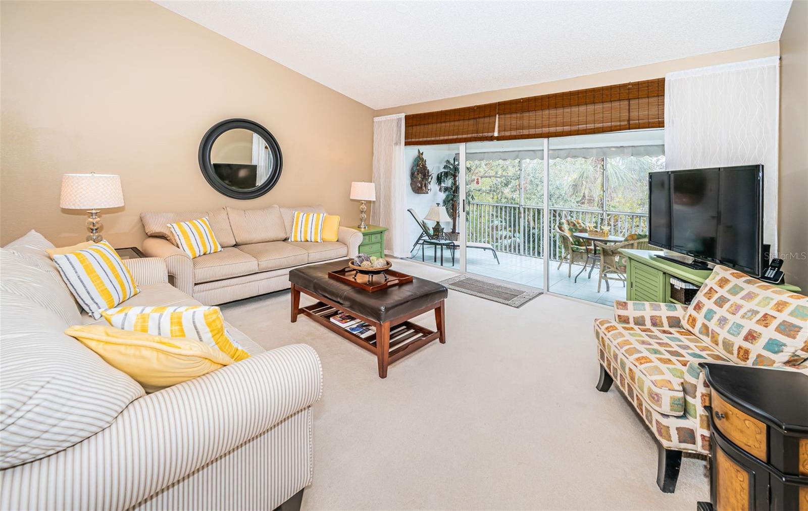 .. Living room shot Looking In. Note: Upper Floor Enjoys  Vaulted Ceiling Height.