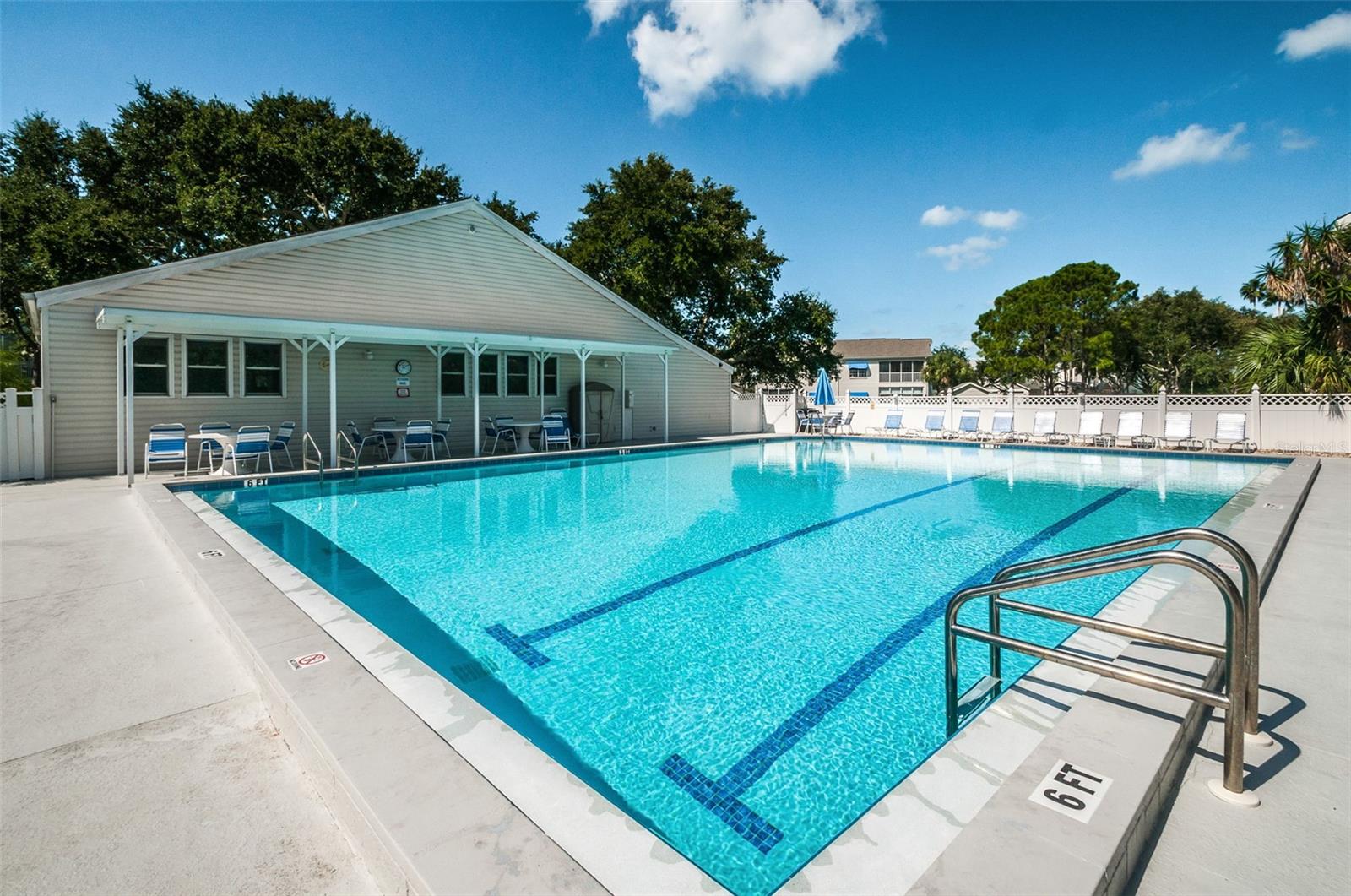 .. Clubhouse #2 with Heated Lap Pool.. Shot #1.. Inside Building is the Workout facility..