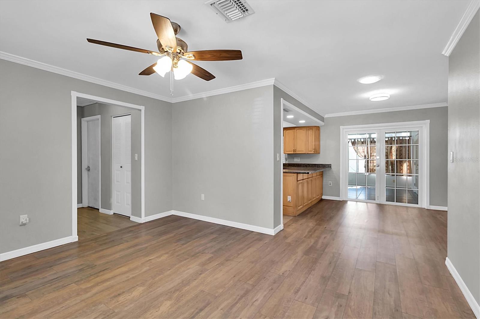 Living room facing dinette and kitchen