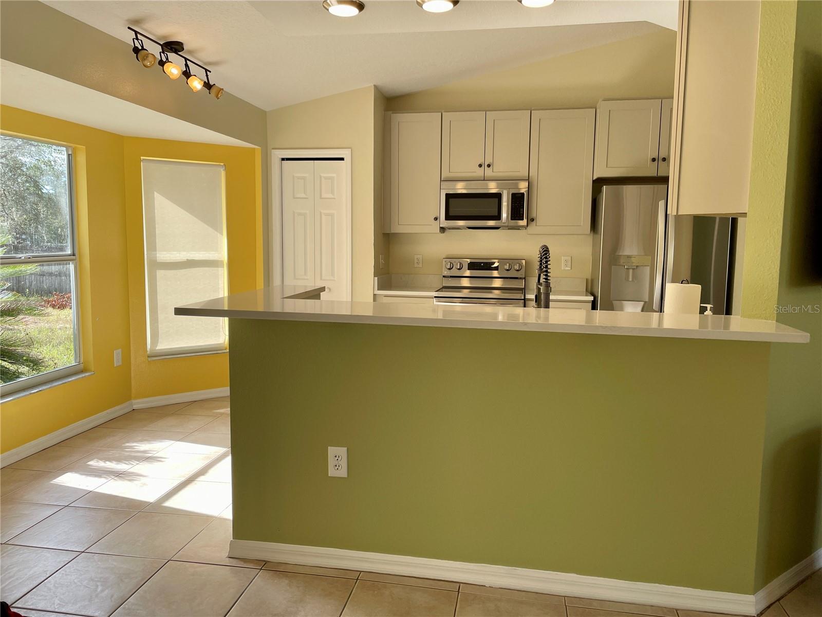 Kitchen with bar seating