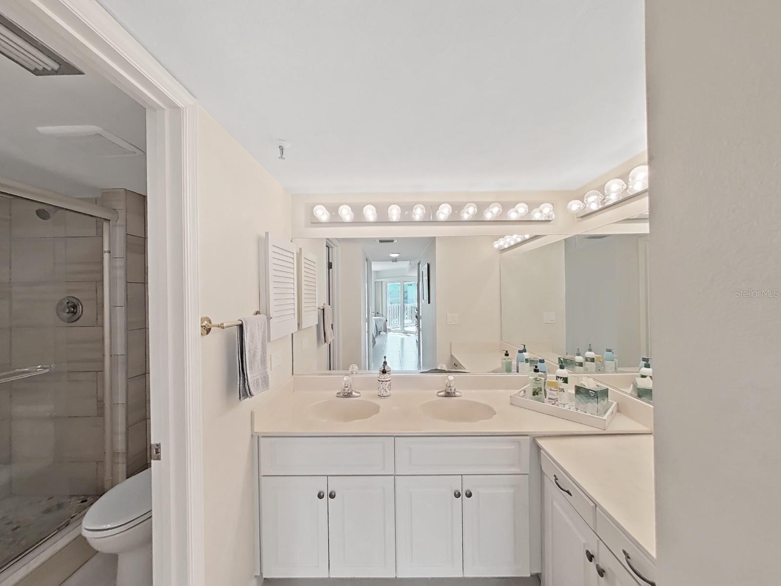 Dual sinks surrounded with mirrors!