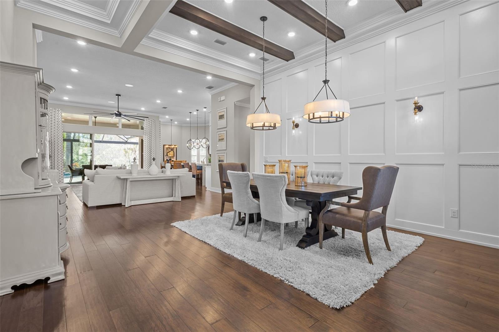 Dining Area with exposed beams and