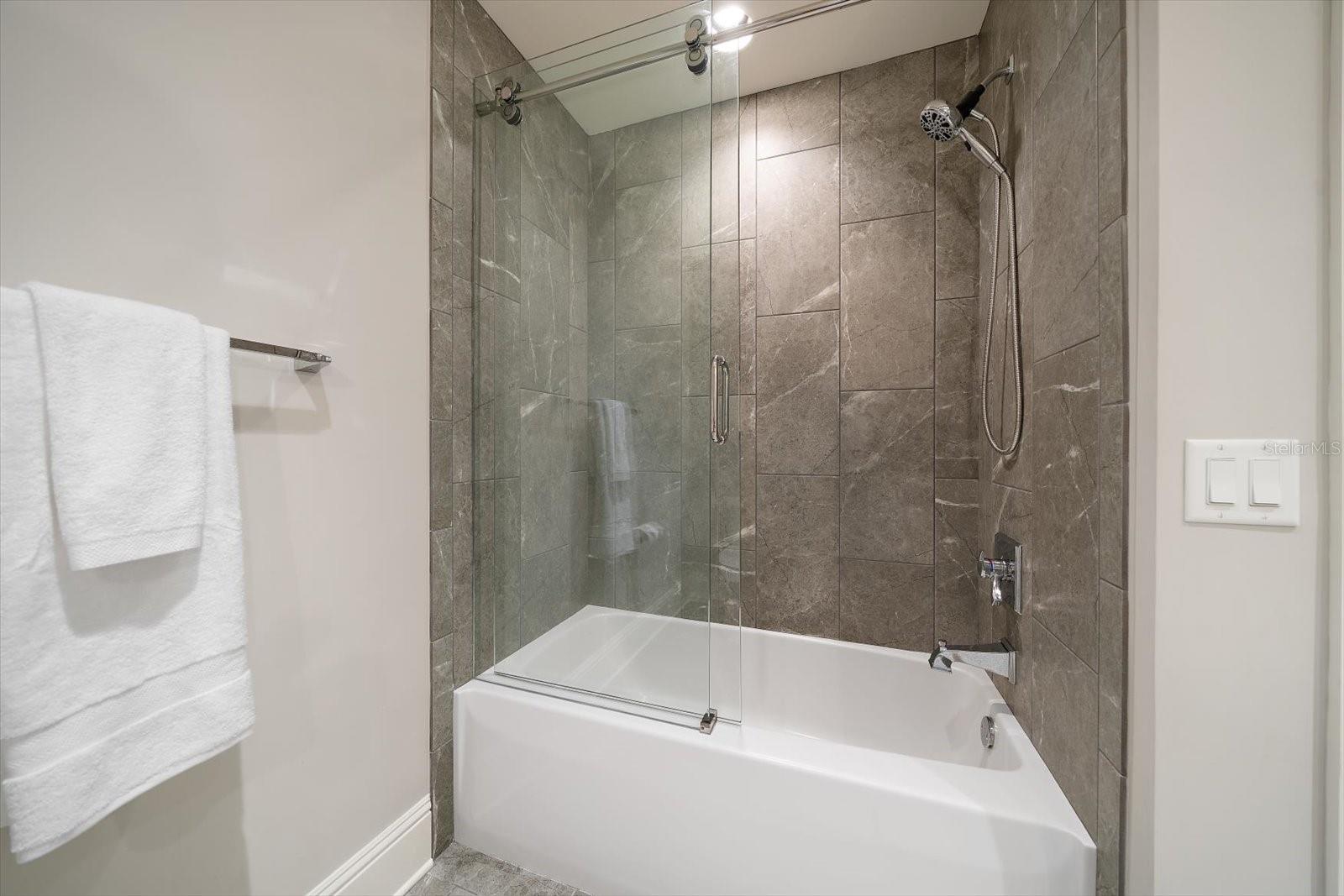 Hall Bathroom Tub with Glass Doors