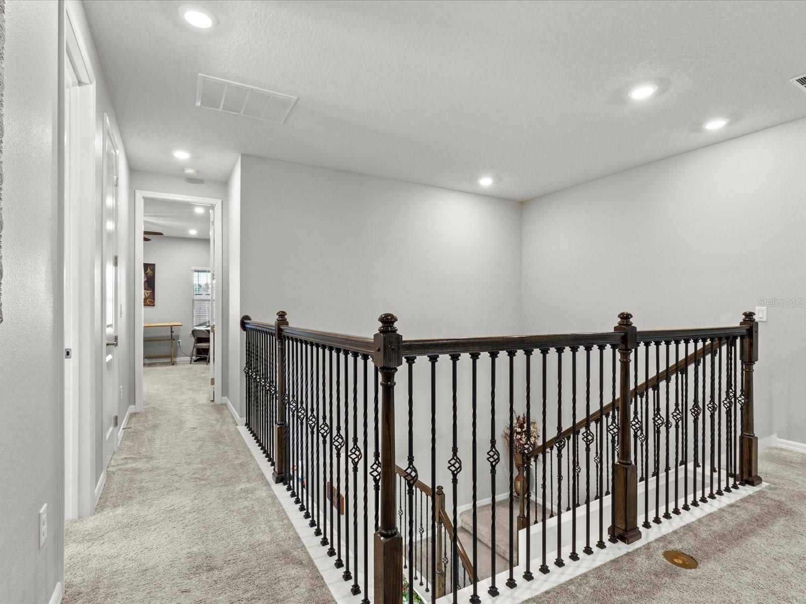 upstairs landing facing bedroom 3 with bathroom 2