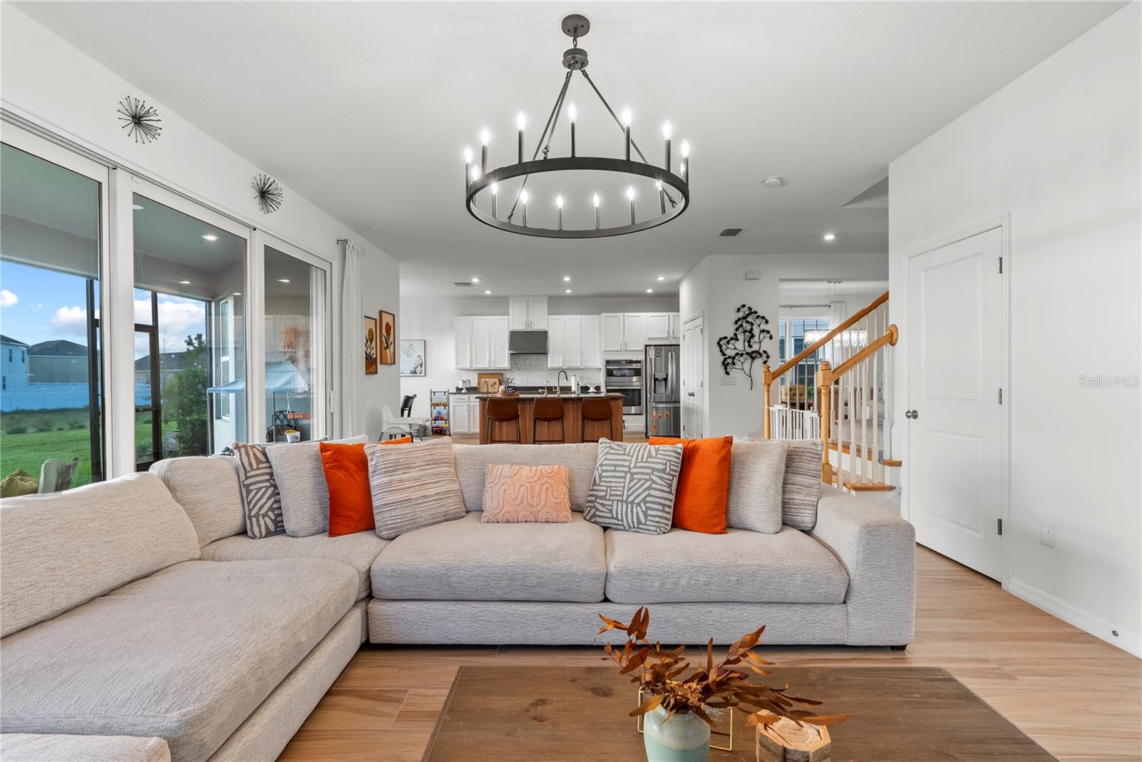 Open floor plan showcasing the family room, kitchen, and dinette.