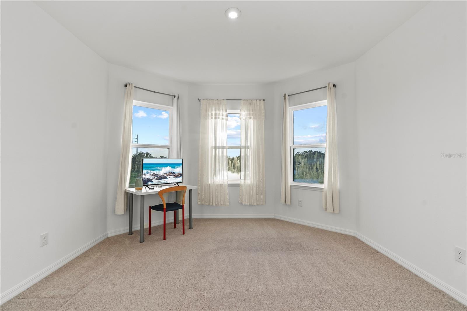 Bedroom 4: featuring a water view.