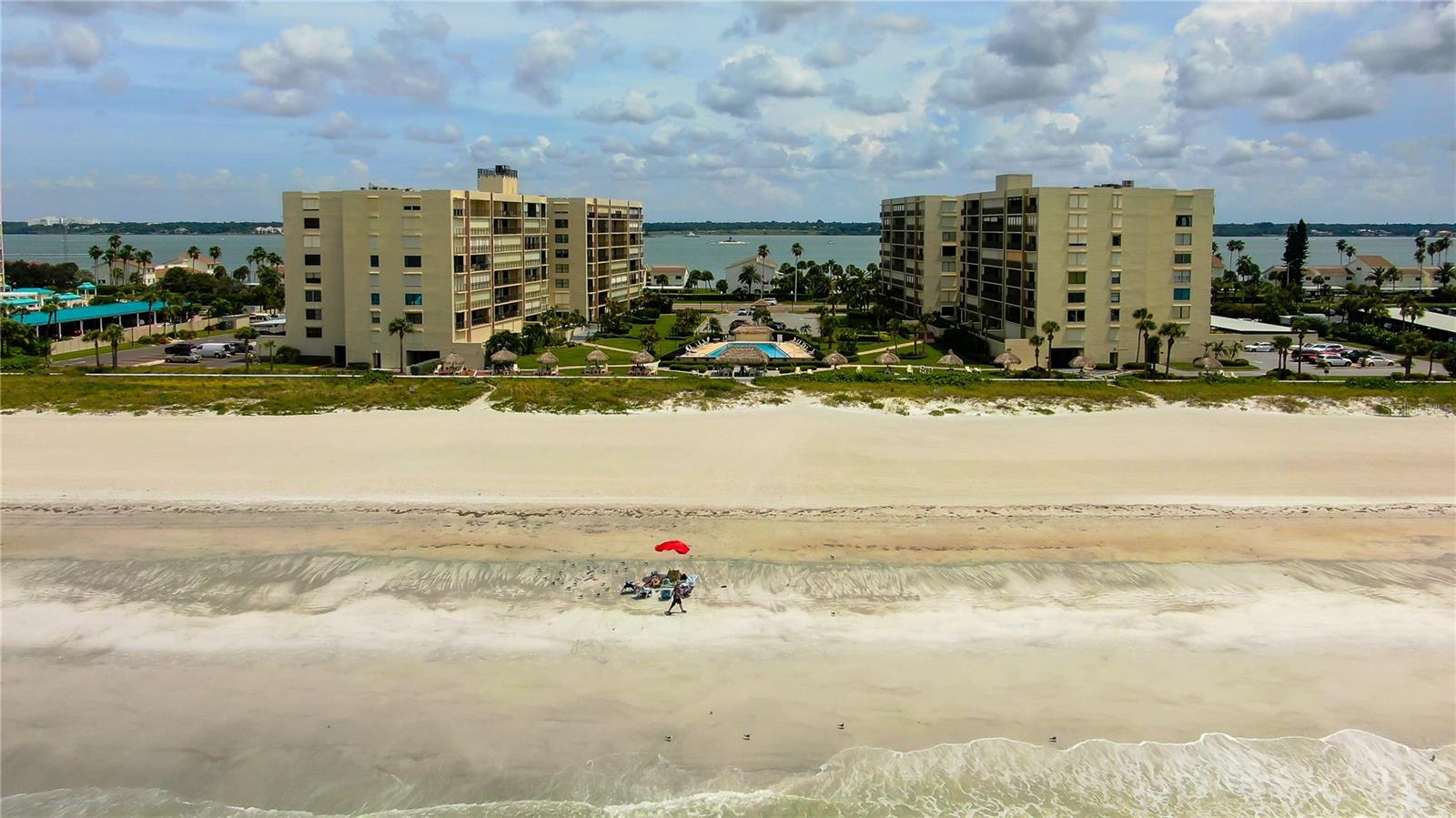 VIEW OF BUILDING FROM BEACH