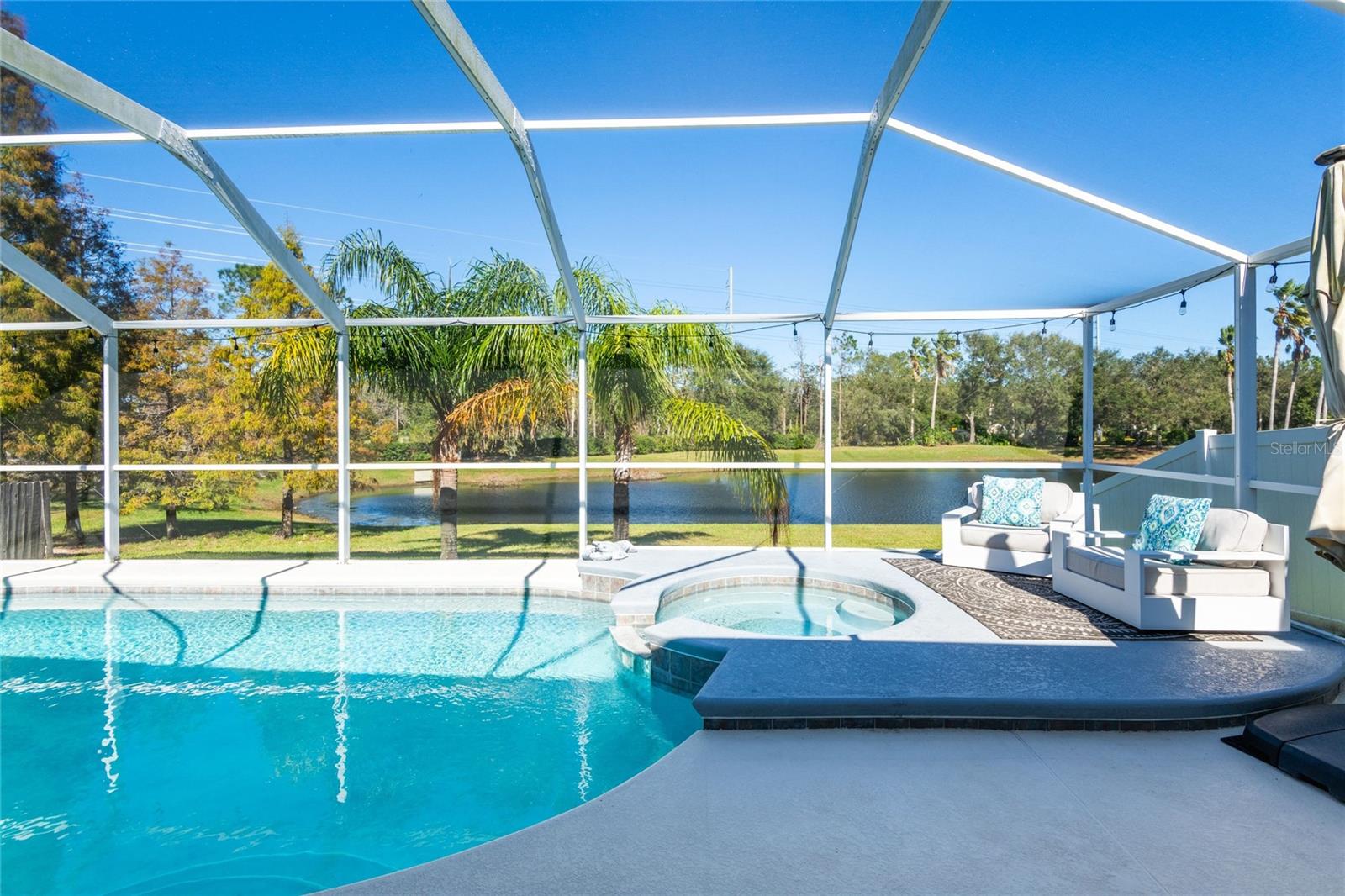 Relaxing outdoor space with lights on the lanai!