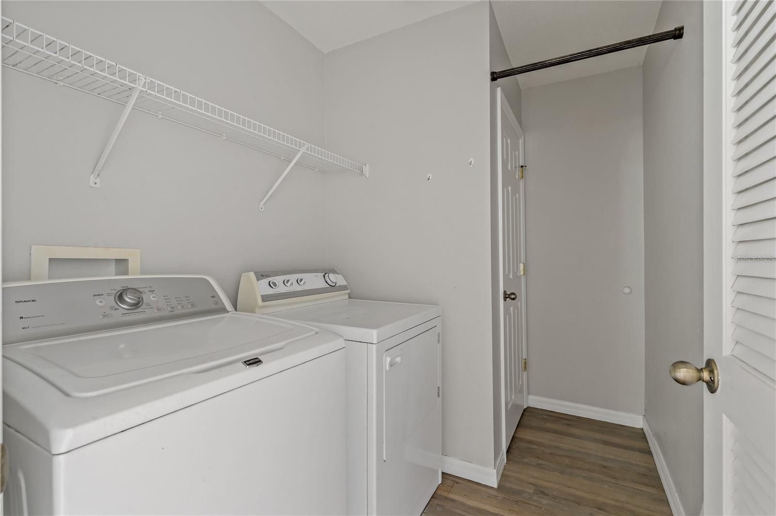 LAUNDRY ROOM WITH UTILITY CLOSET JUST INSIDE FROM THE GARAGE!