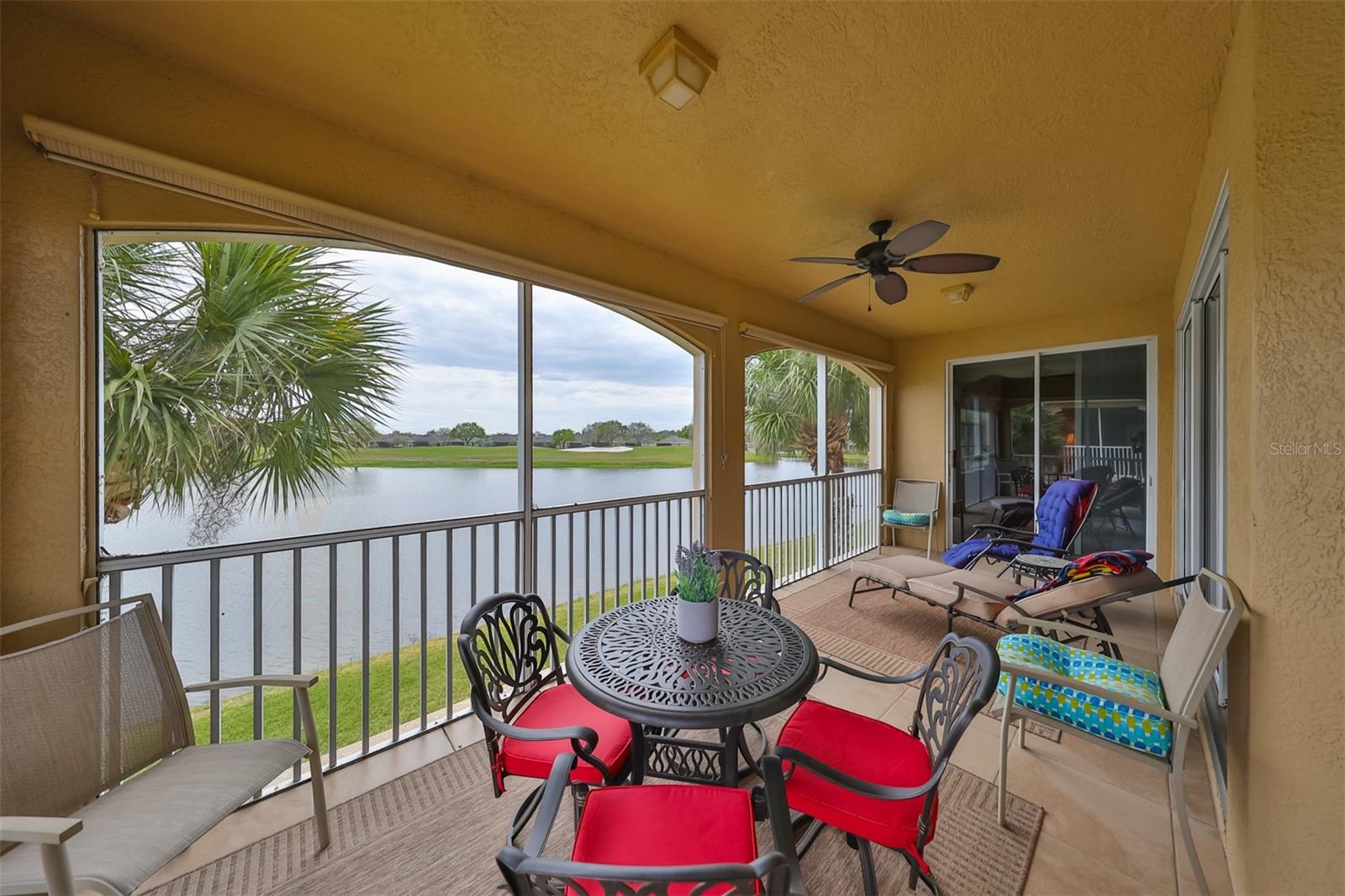 Screened lanai overlooking the water and golf course offer the maximum space for relaxing and watching the world go by.