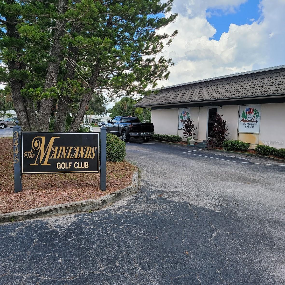 The Public Golf Course entrance is just up the street from this home.