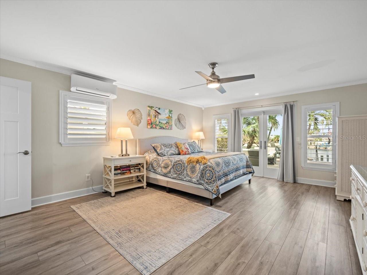 First floor bedroom with access to pool