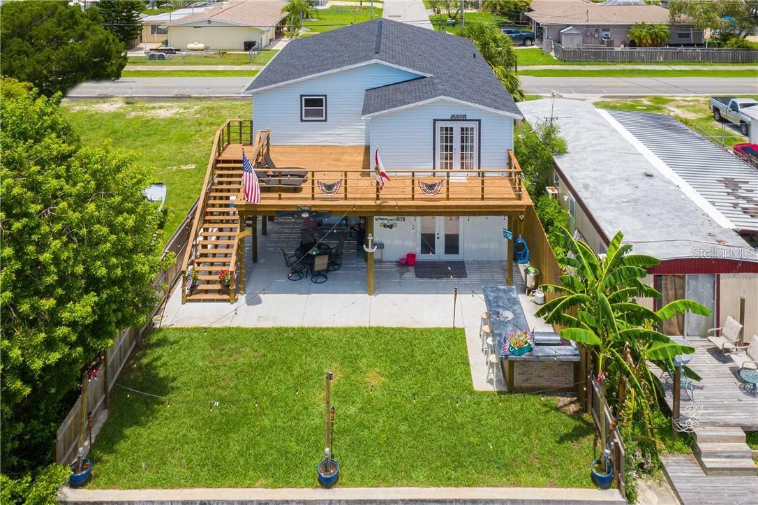 back yard with outdoor kitchen