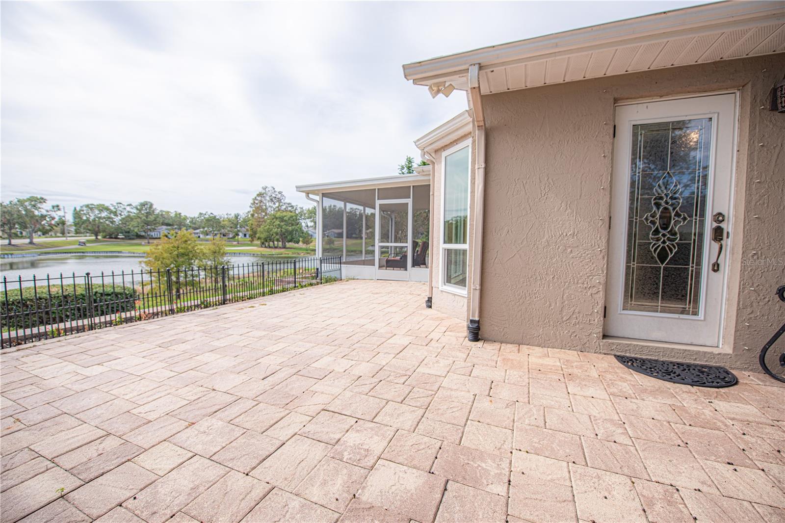 PAVER PATIO TO ENJOY THE BACKYARD OASIS