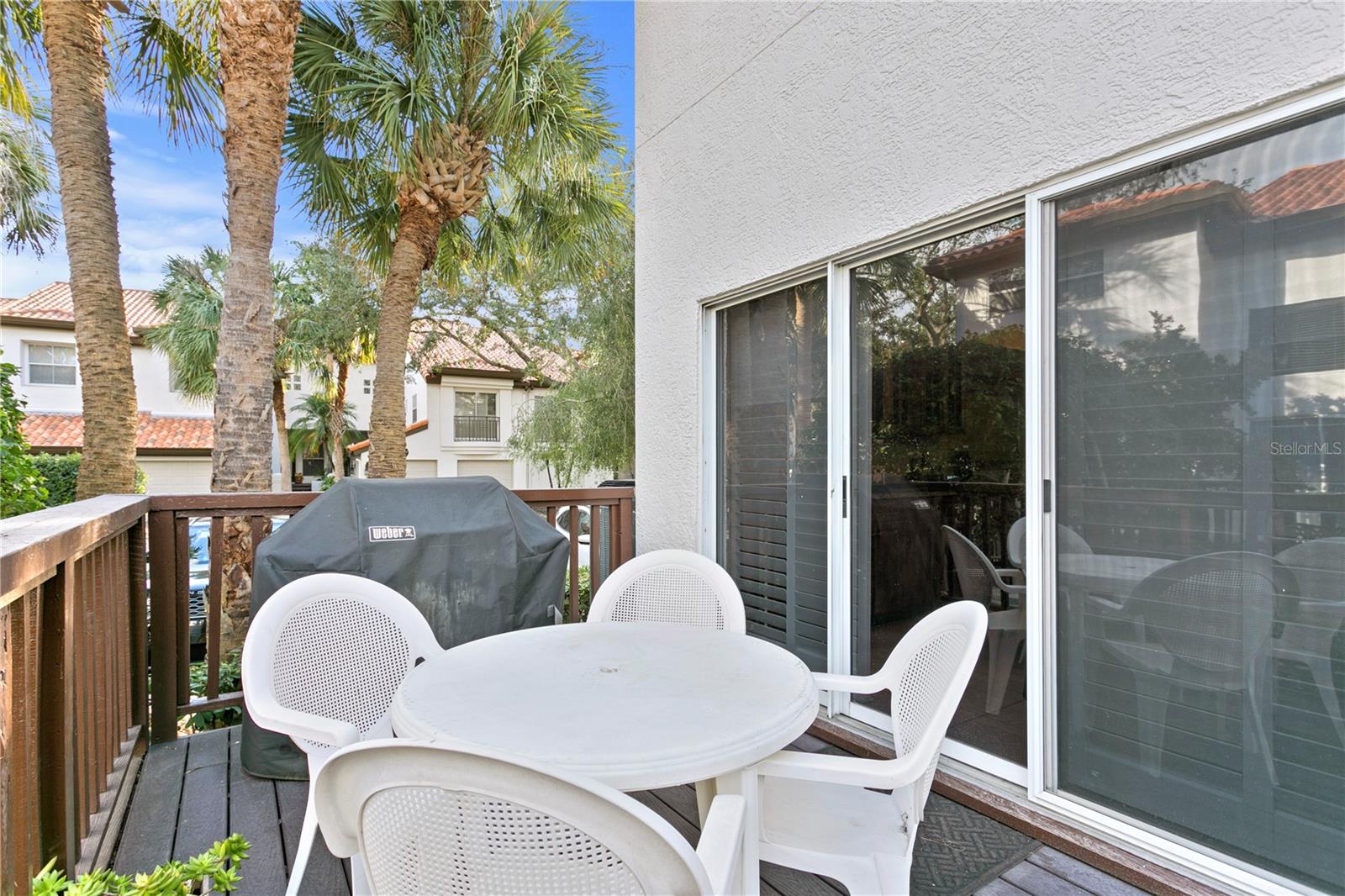 Your great outdoor deck space steps away from your dining and living room