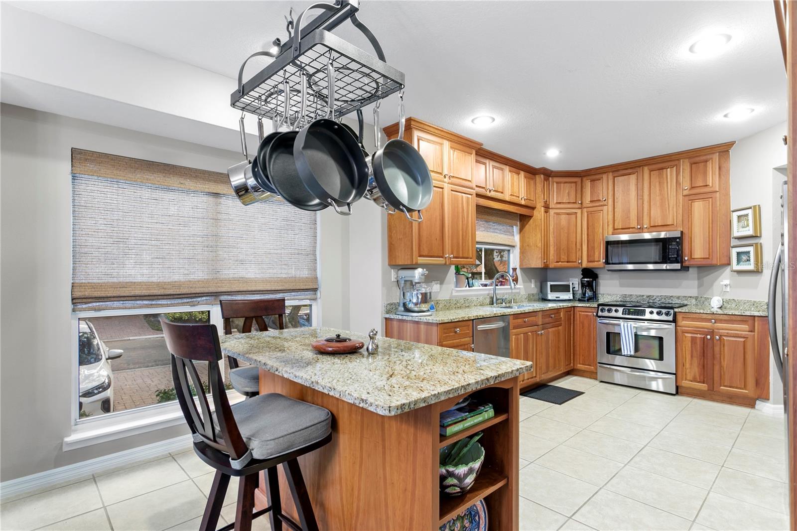 Nicely sized kitchen with loads of cabinetry and a nicely proportioned island for extra prep space