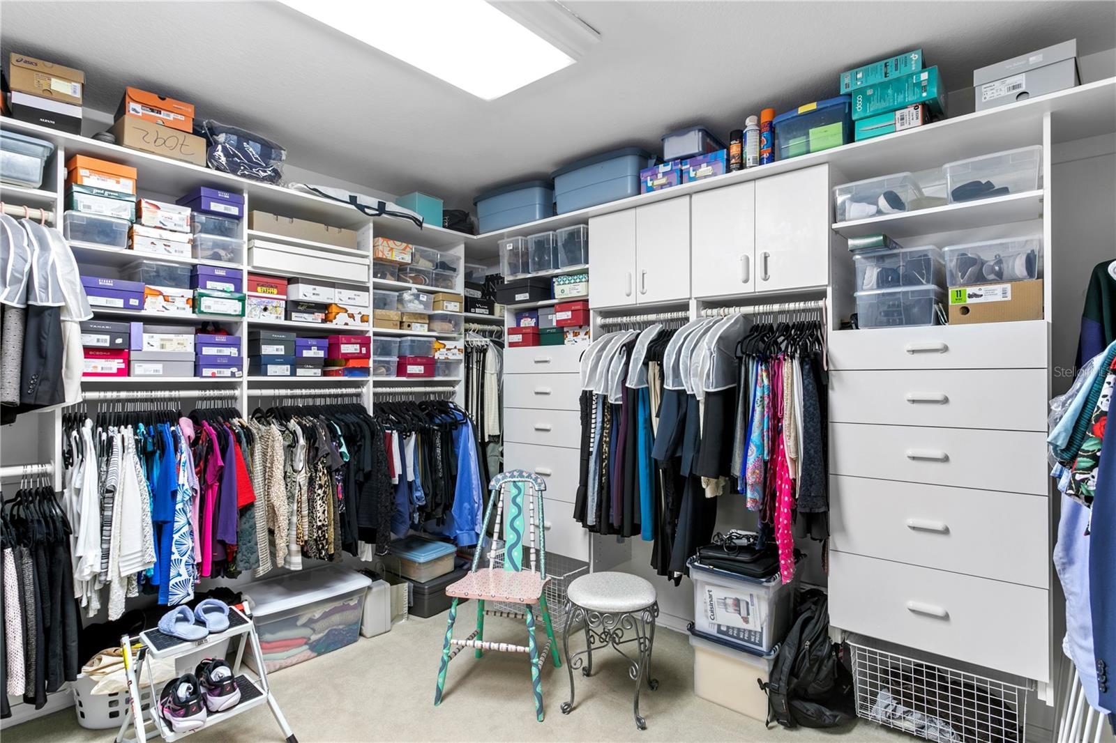 The primary suite enjoys an oversized and organized walk-in closet