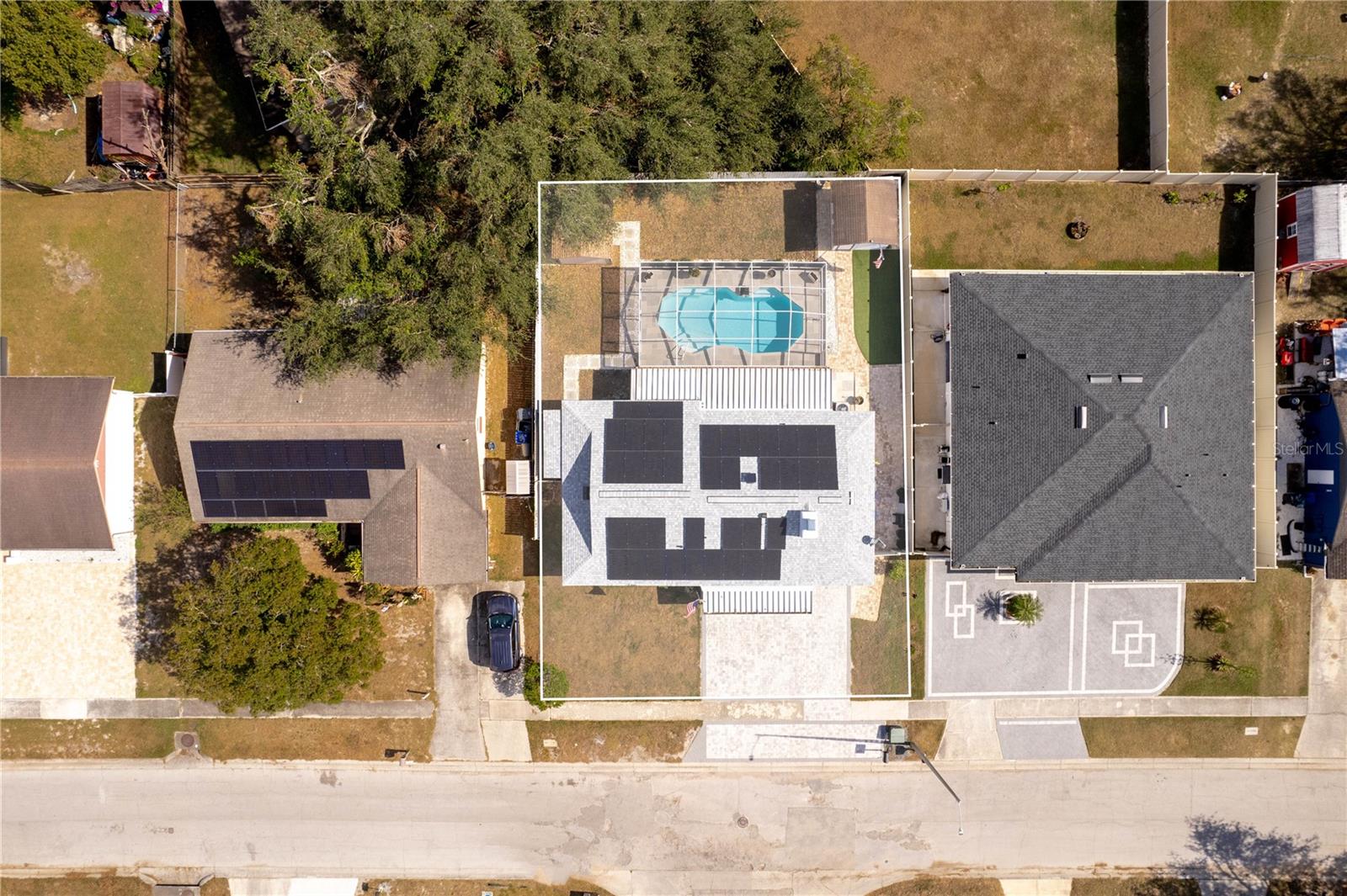 Birdseye view of home and pool