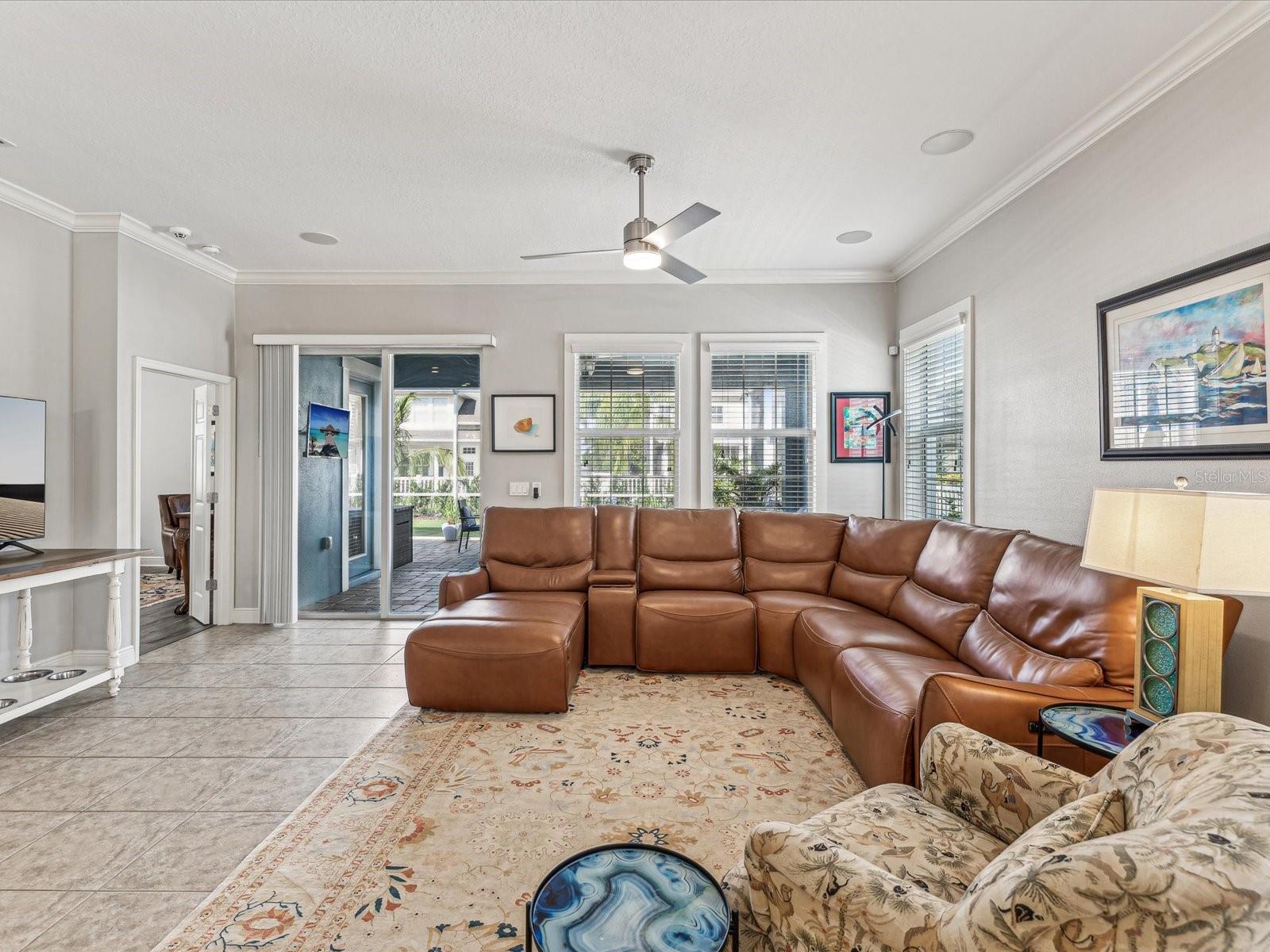 This open living room design takes advantage of the natural light and functional space.