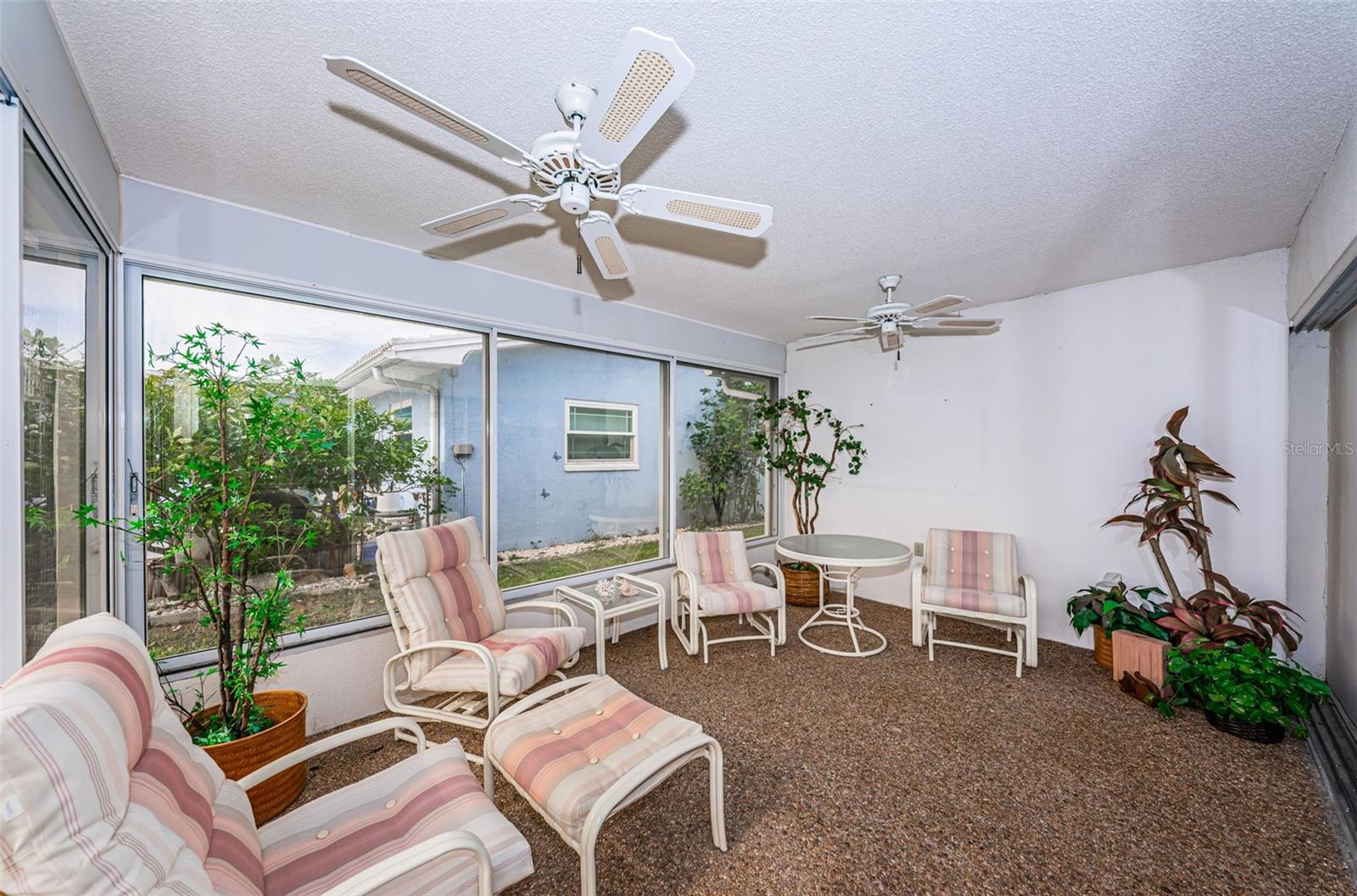 Glass enclosed back patio