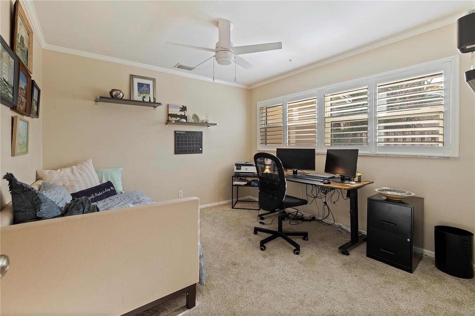 Third bedroom being used as an office.