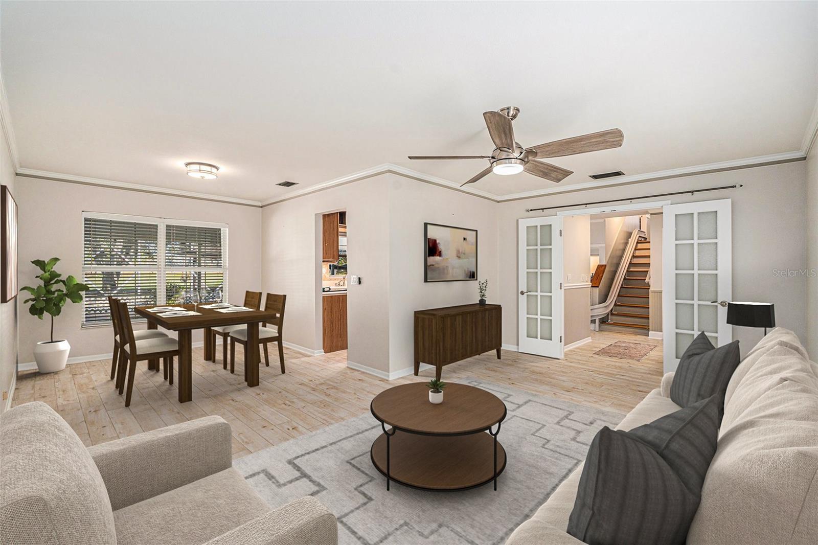 Living and dining room featuring french doors to provide privacy