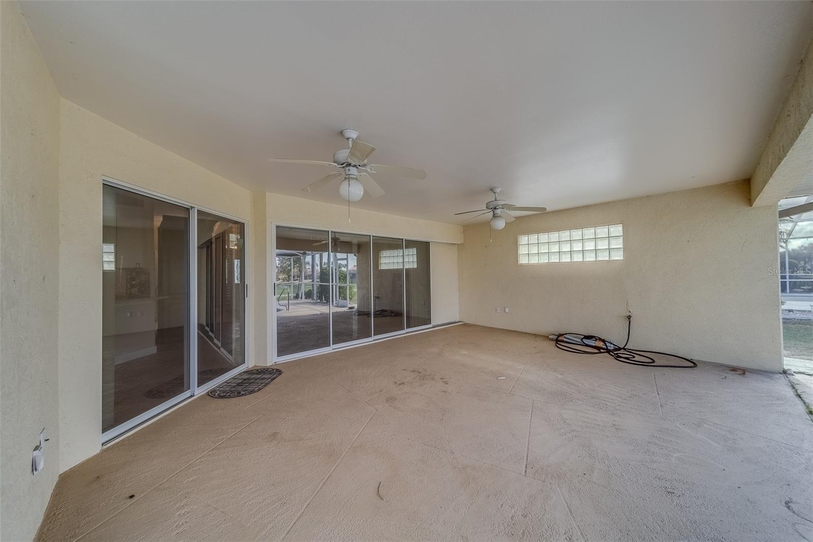 Covered Patio Overlooking the pool and Golf Course