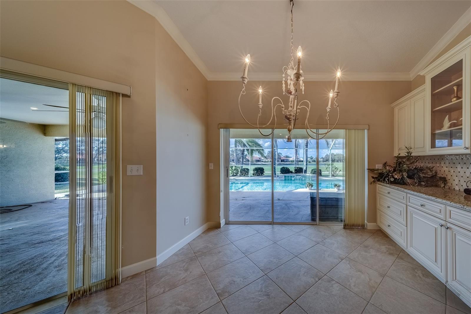 Eat In Kitchen with Sliders to the Patio and Pool