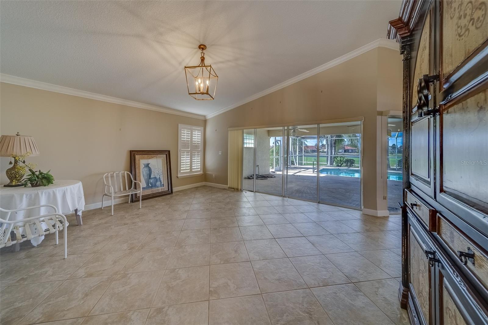 Large Living Area with Sliders to the Patio and Pool