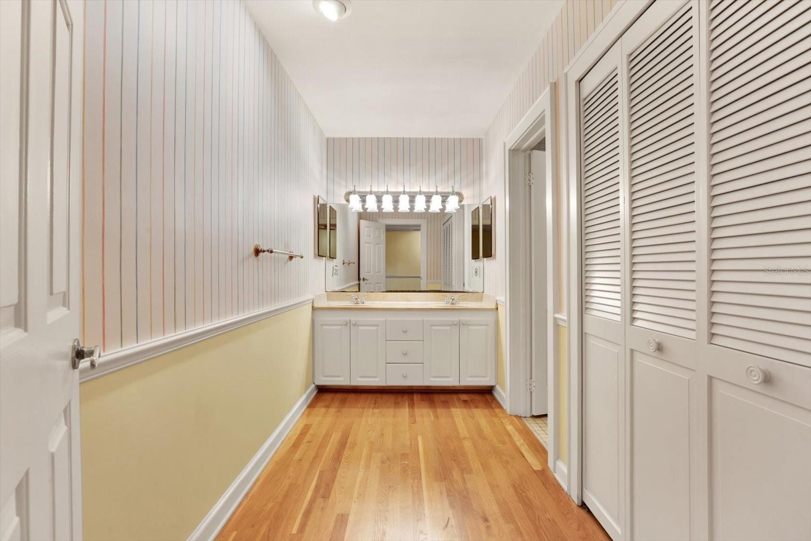 Large bathroom with additional closets