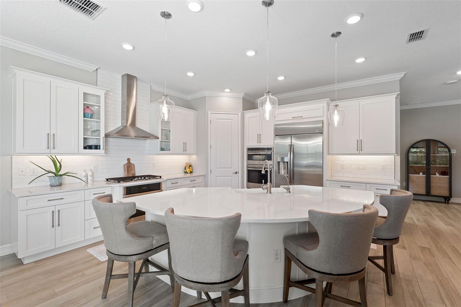 Oversized island with breakfast bar.