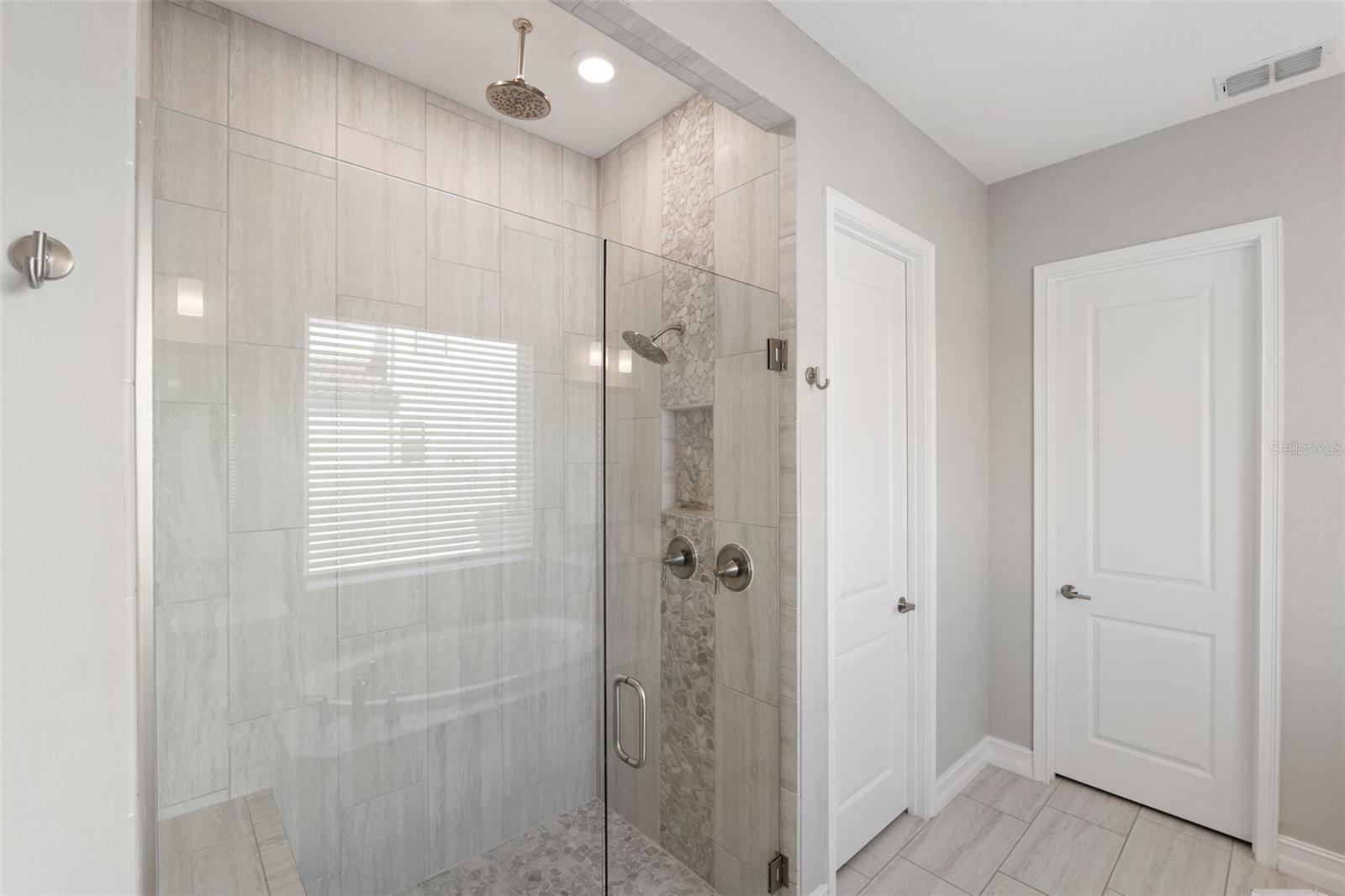 Separate shower and private water closet in the Primary bathroom.