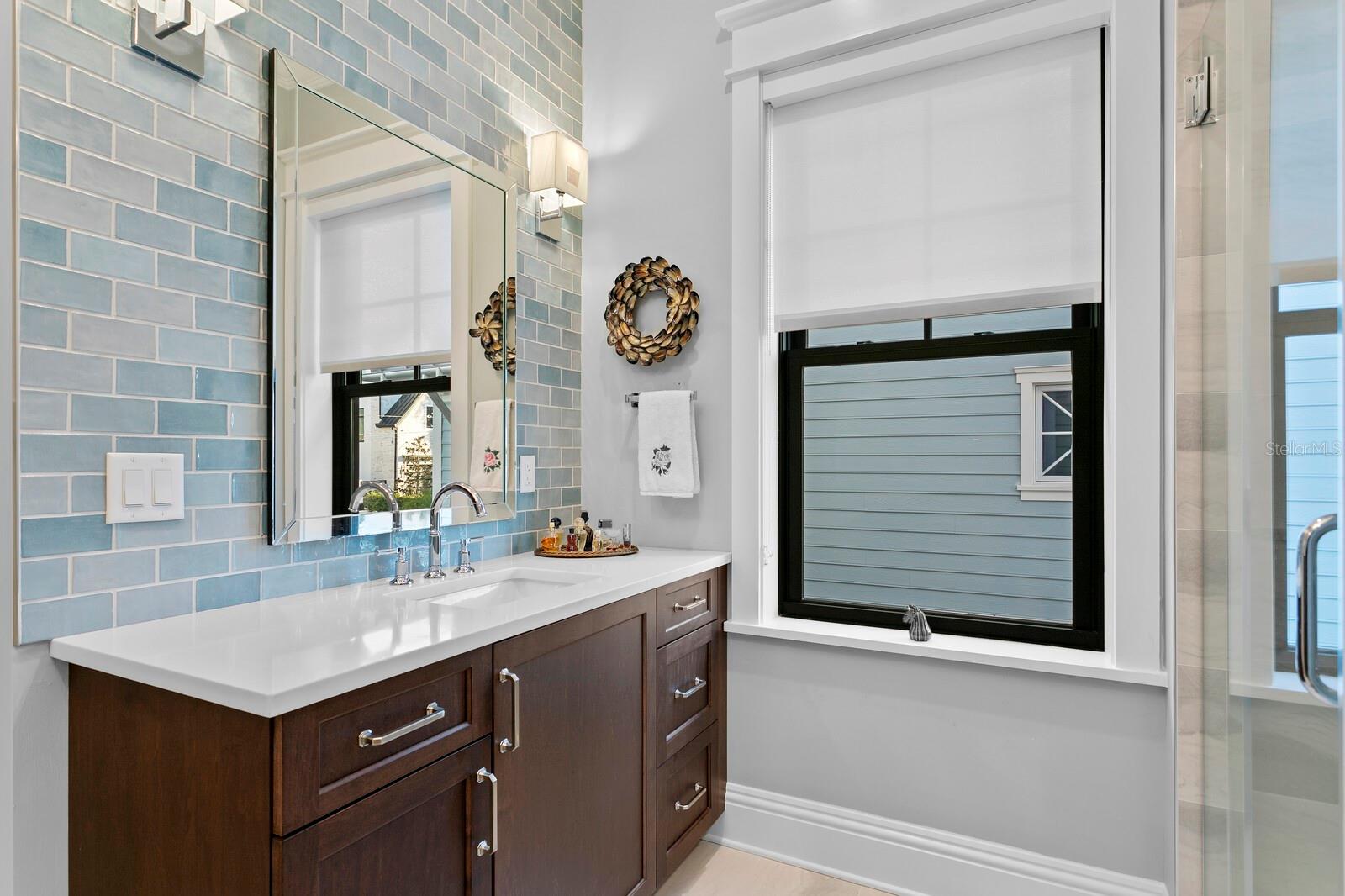 Multi-generational ensuite with dual vanities