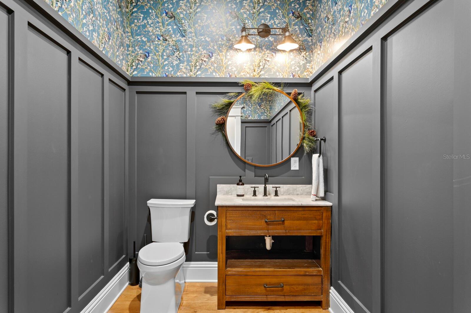 Powder room with custom wallpapaer