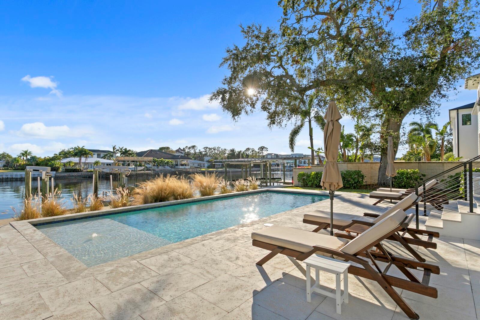 Saltwater pool with sun shelf