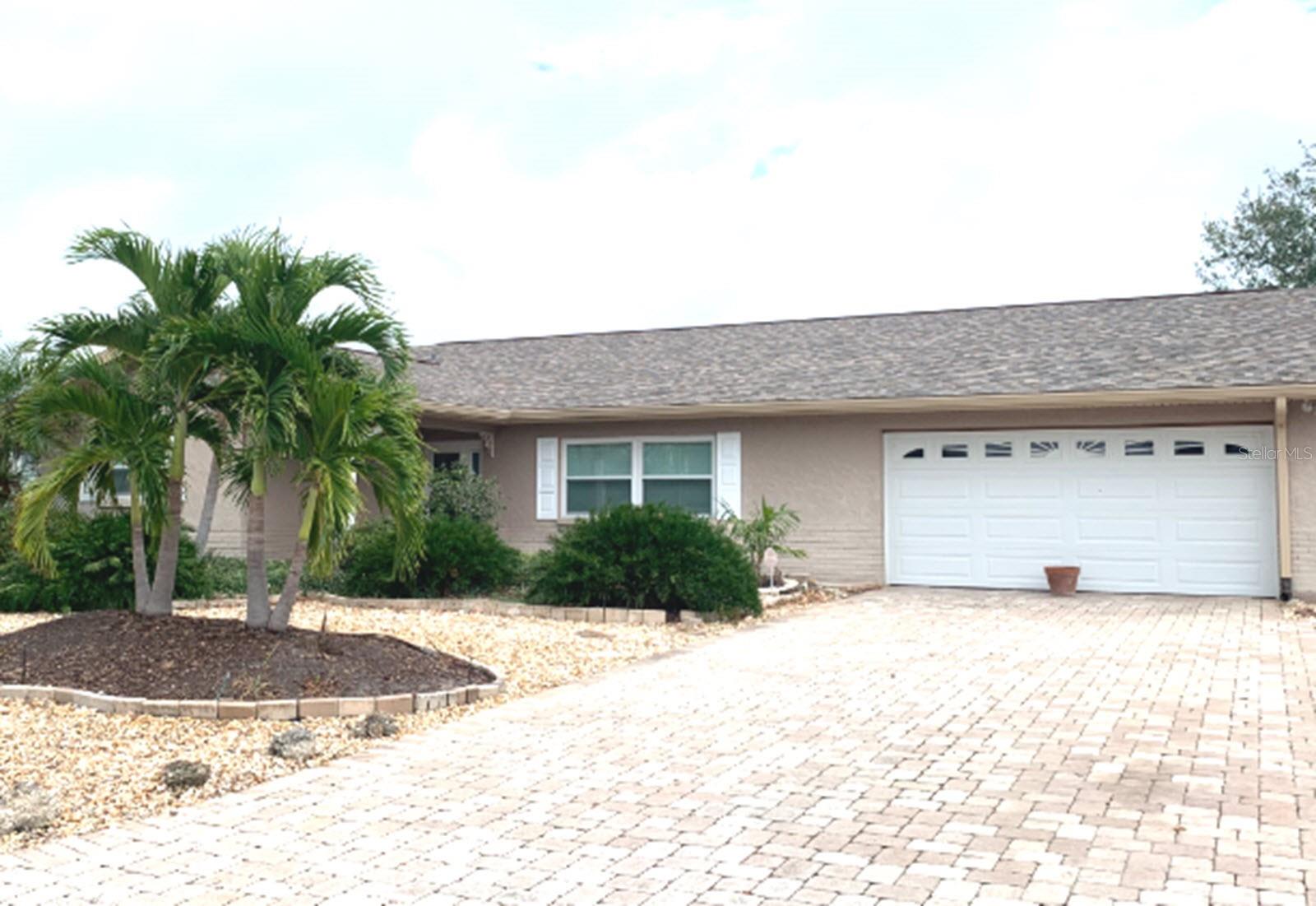 Pavers in driveway newer garage door