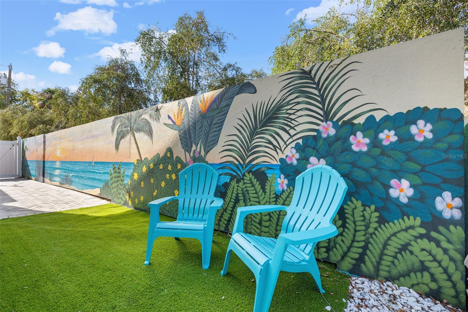 Pet-friendly turf; private patio with custom Vitale Brothers Mural