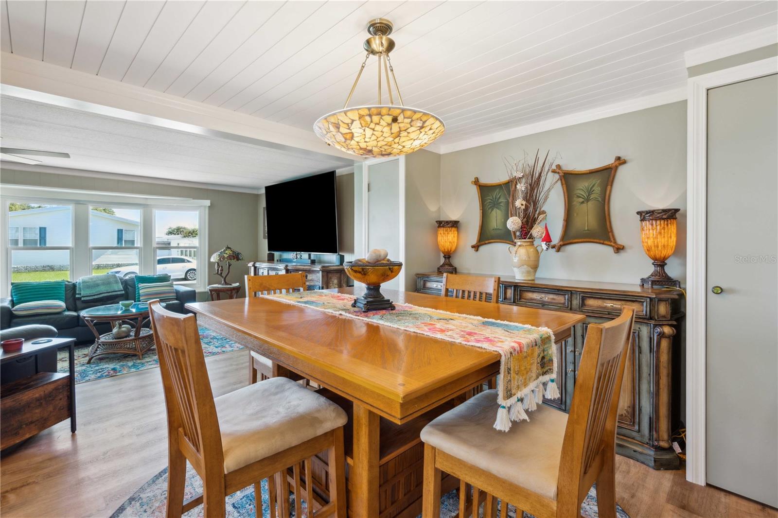 Dining area is open with kitchen and living room.