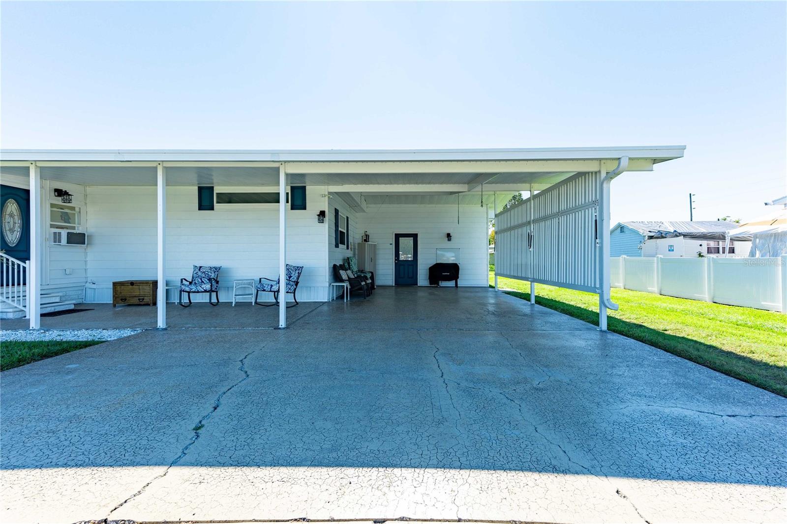 Oversized painted carport.